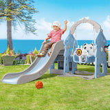 Child playing on kids' slide swing set with basketball hoop in blue, enjoying outdoor fun and exercise.
