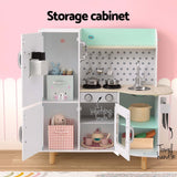 Kids pretend kitchen storage cabinet with working knobs and accessories for imaginative play.
