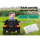 Child enjoying a ride-on SUV car with adult remote control features for safety and fun.