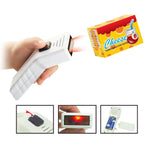 Hand holding a barcode scanner toy with light effects, designed for kids' supermarket play set.